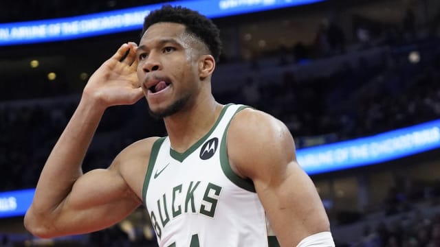 Milwaukee Bucks forward Giannis Antetokounmpo (34) gestures after dunking the ball against the Chicago Bulls 